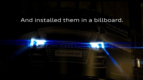Audi A4 встроила в рекламный баннер в Брюсселе фары 